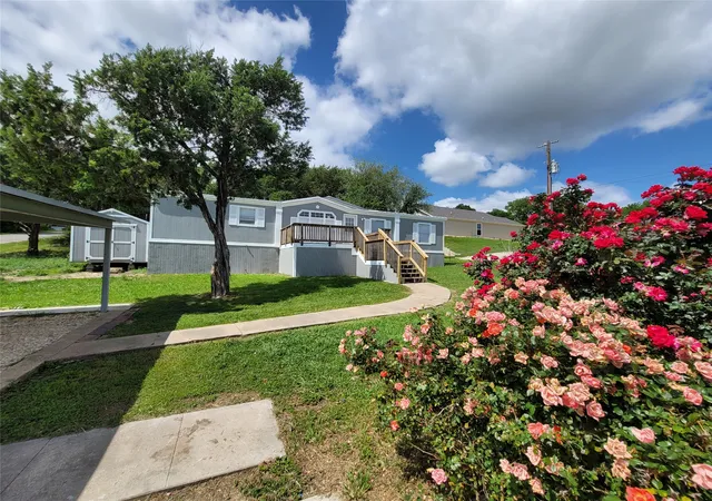 Photo 1 of Manufactured home for sale at 902 Devil's River Dr, Granbury, TX 76048 | MLS# 21238222 | Listing updated on 2026-07-04