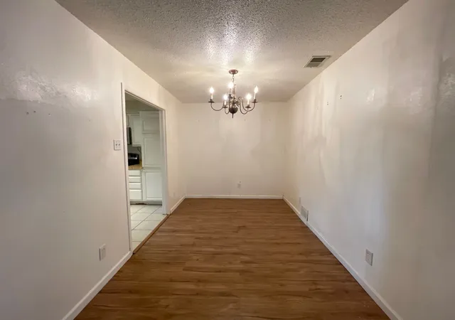 Photo 3 of Townhouse for sale at 9726 Amberton Pkwy, Dallas, TX 75243 | MLS# 21237495 | Listing updated on 2026-09-25