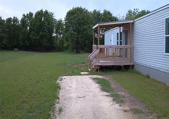 Photo 3 of Manufactured home for sale at 6102 S Lakeside Hills Ct, Granbury, TX 76048 | MLS# 21238703 | Listing updated on 2026-09-30