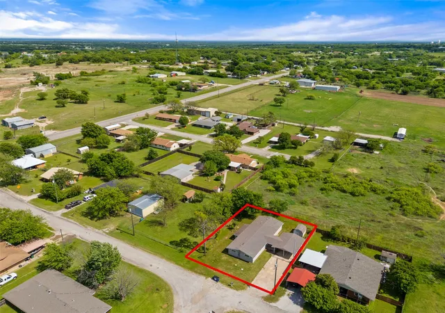 Photo 2 of Single family home for sale at 205 April St, Bowie, TX 76230 | MLS# 21241904 | Listing updated on 2026-08-17