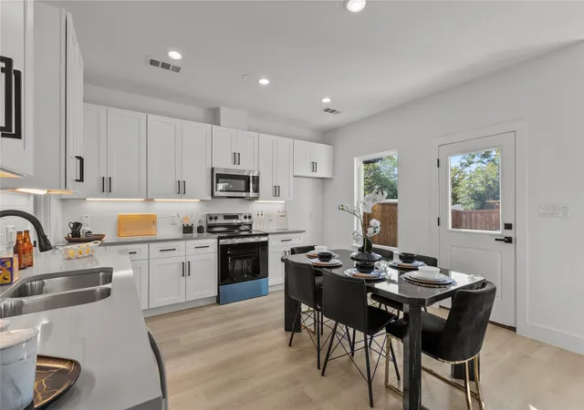 Photo 2 of Townhouse for sale at 124 Homes Dr, Grand Prairie, TX 75050 | MLS# 21240698 | Listing updated on 2026-08-27