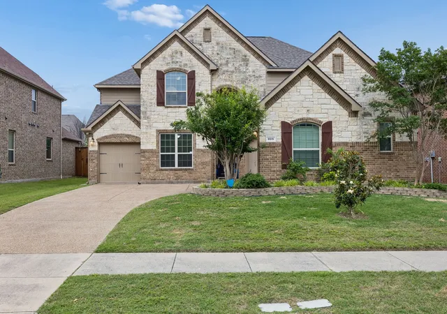 Photo 1 of Single family home for sale at 9519 Amberwoods Ln, Frisco, TX 75035 | MLS# 21246565 | Listing updated on 2026-08-23