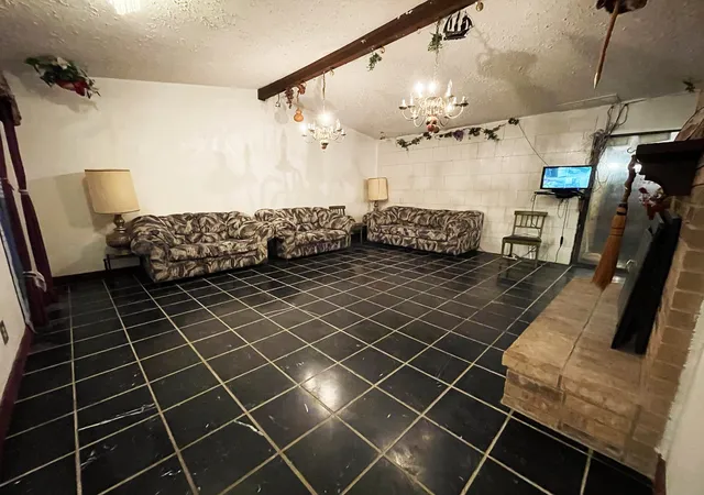 Photo 3 of Single family home for sale at 1801 Vine Dr, Garland, TX 75040 | MLS# 21253739 | Listing updated on 2026-09-29