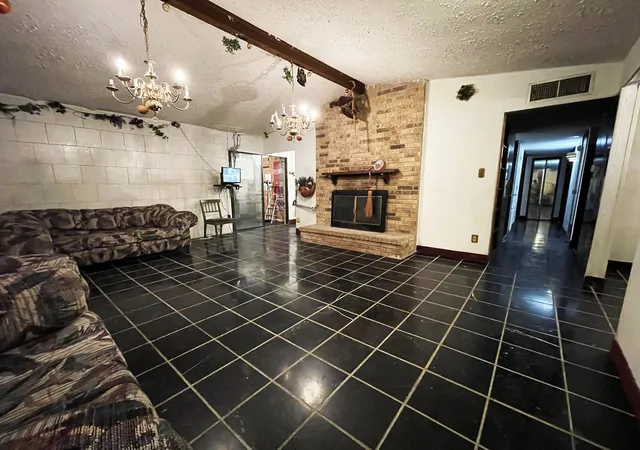 Photo 4 of Single family home for sale at 1801 Vine Dr, Garland, TX 75040 | MLS# 21253739 | Listing updated on 2026-09-29