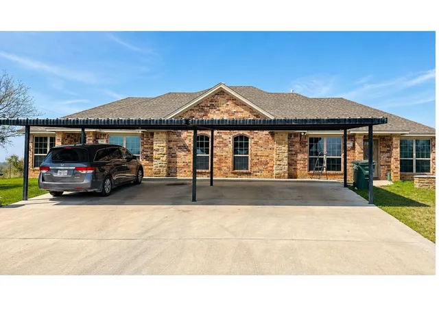 Photo 1 of Multi family home for sale at 399 Erwin Rd #393,395,397,399, Poolville, TX 76487 | MLS# 21254614 | Listing updated on 2026-07-20