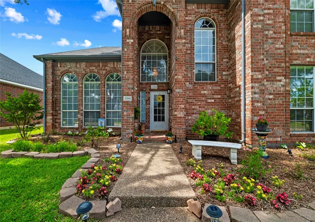 Photo 2 of Single family home for sale at 1184 Pleasant Oaks Dr, Lewisville, TX 75067 | MLS# 21256846 | Listing updated on 2026-07-23