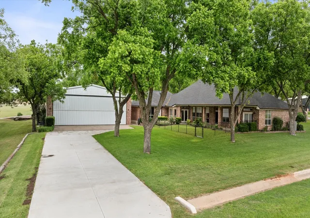 Photo 2 of Single family home for sale at 9616 Air Park Dr, Granbury, TX 76049 | MLS# 21248474 | Listing updated on 2026-07-24