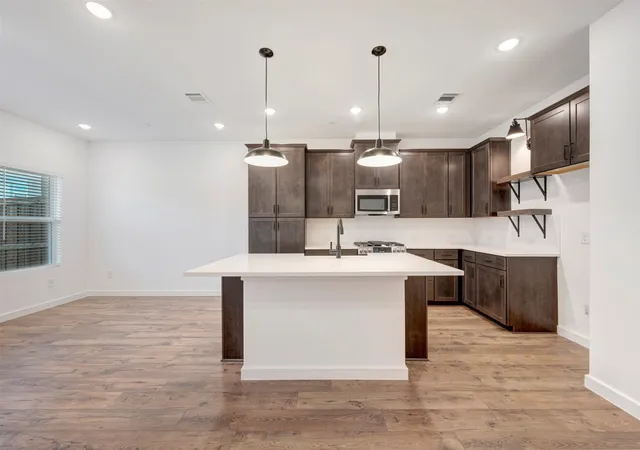 Photo 4 of Townhouse for sale at 9404 Mill St #E, Providence Village, TX 76227 | MLS# 21257241 | Listing updated on 2026-07-10
