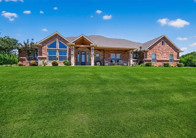 Photo 1 of Single family home for sale at 128 Whispering Winds Dr, Gunter, TX 75058 | MLS# 21239638 | Listing updated on 2026-08-13