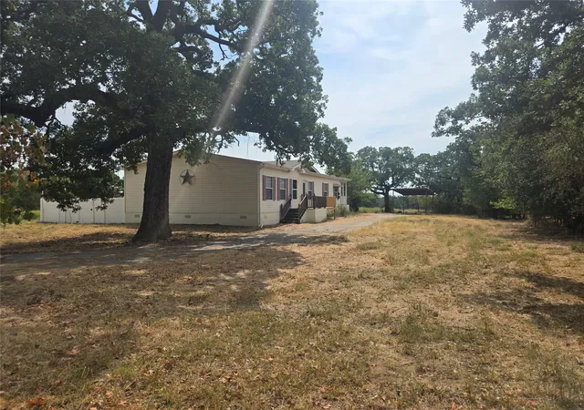 Photo 3 of Manufactured home for sale at 1331 Jay Bird Rd, Springtown, TX 76082 | MLS# 21263060 | Listing updated on 2026-09-26