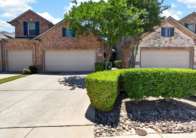 Photo 1 of Townhouse for sale at 1828 Branch Trl, Carrollton, TX 75007 | MLS# 21258636 | Listing updated on 2026-08-22