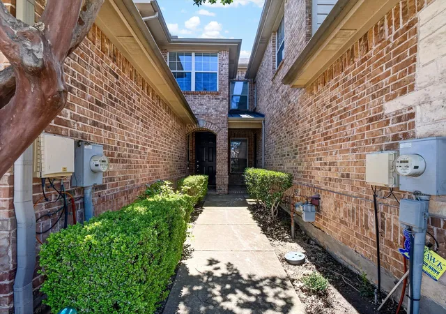 Photo 3 of Townhouse for sale at 1828 Branch Trl, Carrollton, TX 75007 | MLS# 21258636 | Listing updated on 2026-08-22