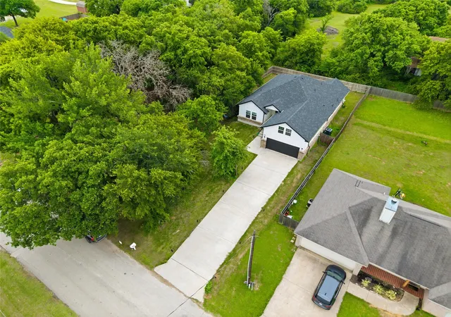 Photo 2 of Single family home for sale at 203 Pioneer Dr, Keene, TX 76059 | MLS# 21262643 | Listing updated on 2026-07-21