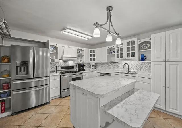 Photo 3 of Single family home for sale at 3411 Kenwood Wy, Garland, TX 75041 | MLS# 21267118 | Listing updated on 2026-08-17