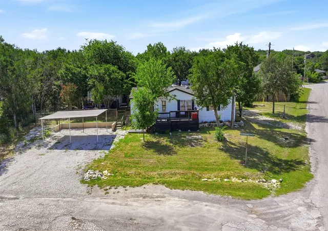 Photo 1 of Manufactured home for sale at 937 Nacogdoches River Dr, Granbury, TX 76048 | MLS# 21267366 | Listing updated on 2026-07-26