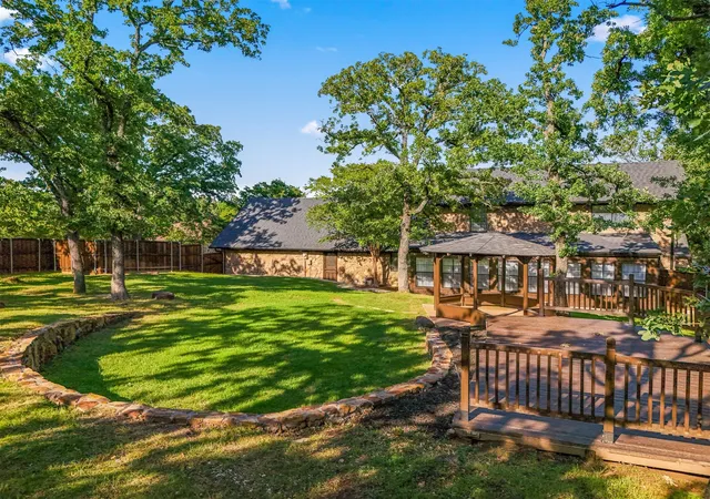 Photo 1 of Single family home for sale at 180 N Woodland Trl, Double Oak, TX 75077 | MLS# 21263296 | Listing updated on 2026-09-23