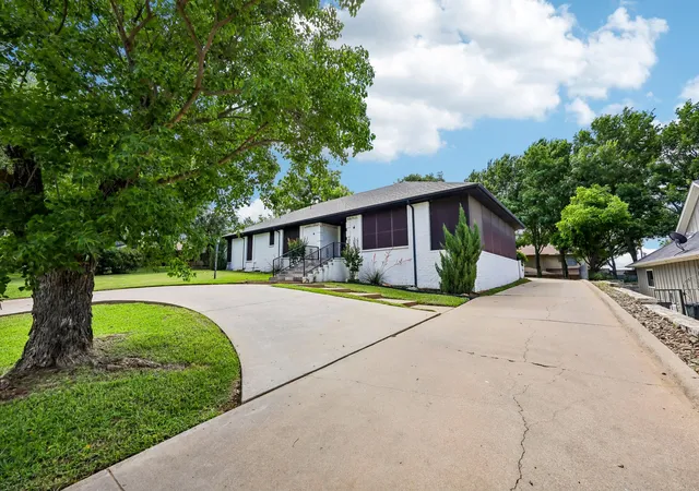 Photo 2 of Single family home for sale at 5209 Fairway Cir, Granbury, TX 76049 | MLS# 21267330 | Listing updated on 2026-08-24