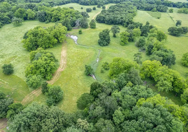 Photo 1 of Land for sale at 5286 County Road 4502, Wolfe City, TX 75496 | MLS# 21268039 | Listing updated on 2026-08-13