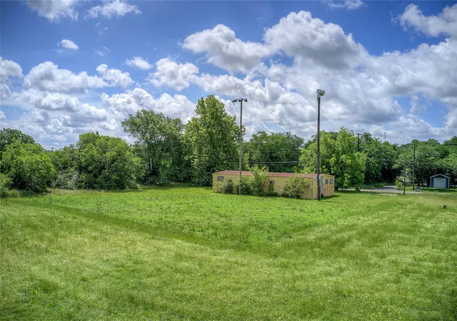 Photo 3 of Land for sale at 414 N Neal St, Commerce, TX 75428 | MLS# 21275034 | Listing updated on 2026-05-25