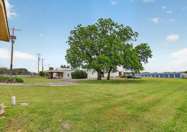 Photo 3 of Single family home for sale at 1092 W Hwy 199, Springtown, TX 76082 | MLS# 21277073 | Listing updated on 2026-07-19