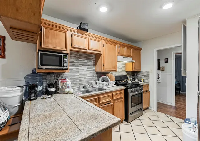 Photo 3 of Single family home for sale at 2211 Cloverdale St, Arlington, TX 76010 | MLS# 21278308 | Listing updated on 2026-07-27