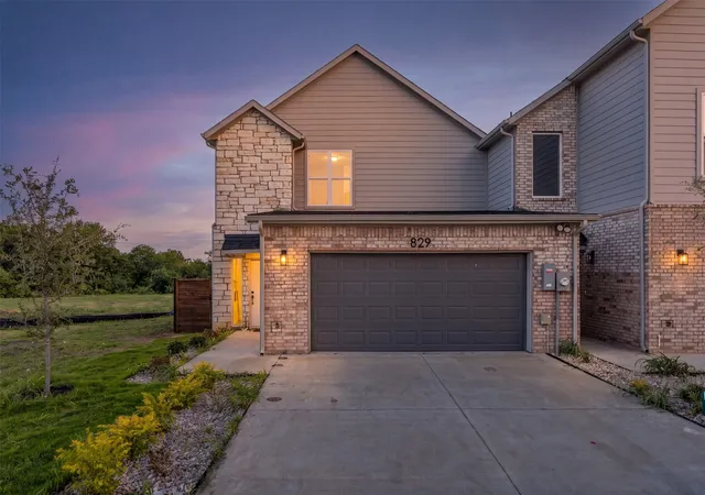 Photo 1 of Townhouse for sale at 825 Premier Pkwy, Grand Prairie, TX 75051 | MLS# 21277953 | Listing updated on 2026-07-27