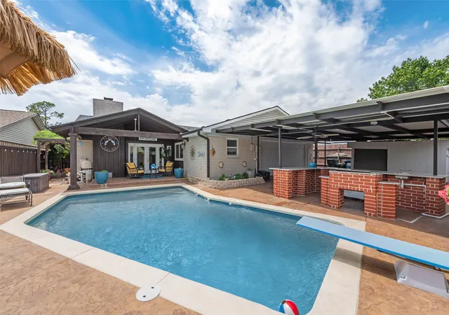 Photo 1 of Single family home for sale at 1911 White Rose Ln, Carrollton, TX 75007 | MLS# 21281515 | Listing updated on 2026-07-25