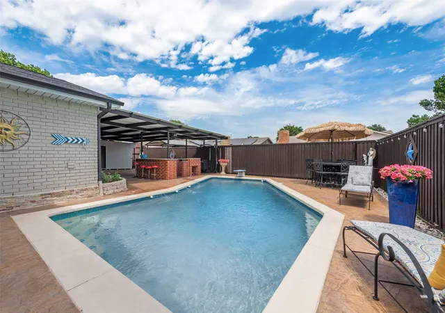 Photo 3 of Single family home for sale at 1911 White Rose Ln, Carrollton, TX 75007 | MLS# 21281515 | Listing updated on 2026-07-25