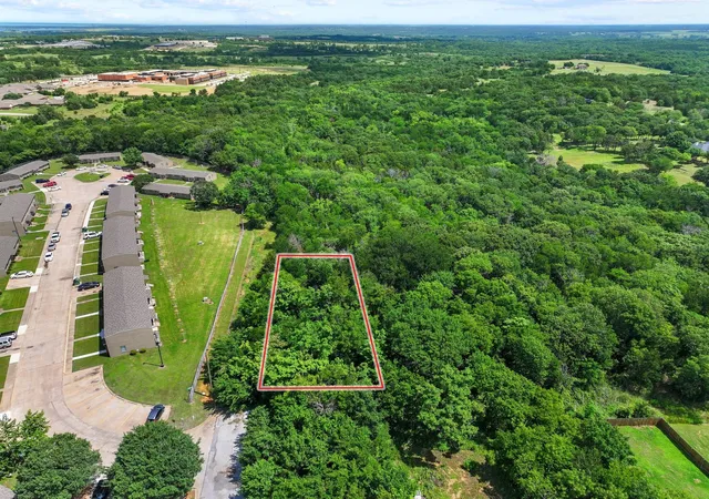 Photo 1 of Land for sale at 1230 N Armstrong Ave, Denison, TX 75020 | MLS# 21279570 | Listing updated on 2026-09-16