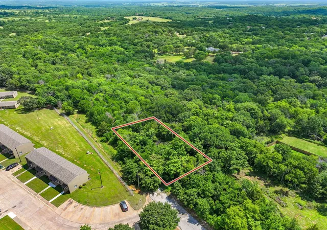 Photo 3 of Land for sale at 1230 N Armstrong Ave, Denison, TX 75020 | MLS# 21279570 | Listing updated on 2026-09-16