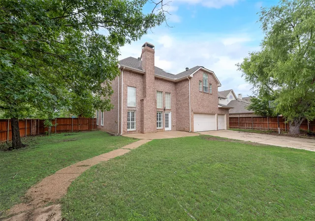 Photo 2 of Single family home for sale at 1303 Westchester Dr, Coppell, TX 75019 | MLS# 21284924 | Listing updated on 2026-08-28
