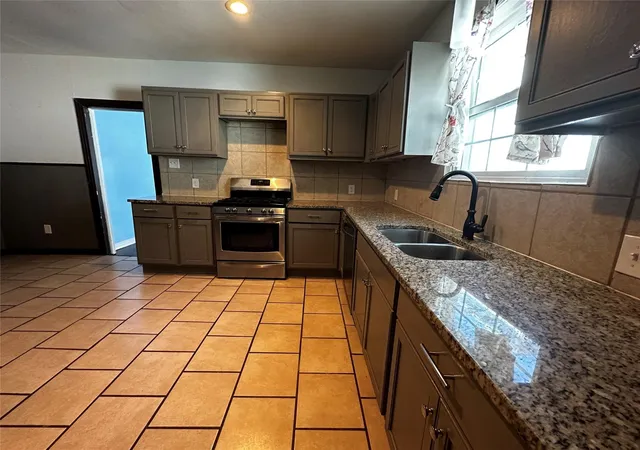 Photo 4 of Multi family home for sale at 1009 E Humbolt St, Fort Worth, TX 76104 | MLS# 21282004 | Listing updated on 2026-10-02
