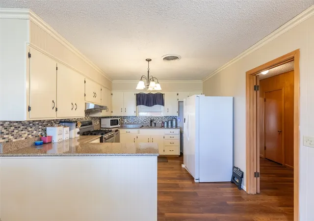 Photo 3 of Single family home for sale at 405 S Breustedt St, Weinert, TX 76388 | MLS# 21287262 | Listing updated on 2026-07-28