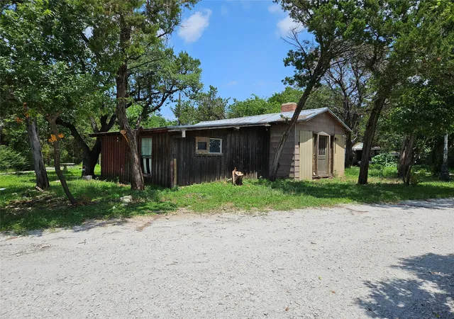 Photo 2 of Single family home for sale at 103 Canyon Dr, Whitney, TX 76692 | MLS# 21288485 | Listing updated on 2026-07-15