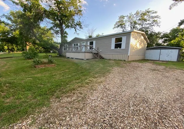 Photo 2 of Manufactured home for sale at 111 Pine St, Ravenna, TX 75476 | MLS# 21289338 | Listing updated on 2026-10-07