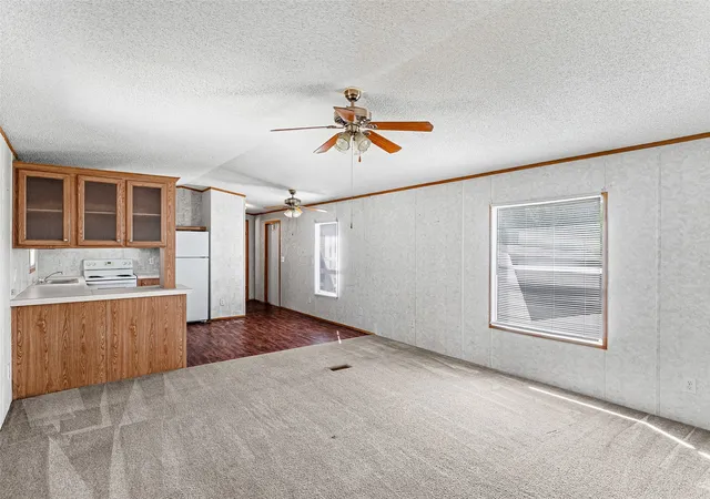 Photo 3 of Manufactured home for sale at 1321 Phoenix Ct, Granbury, TX 76048 | MLS# 21289988 | Listing updated on 2026-10-02