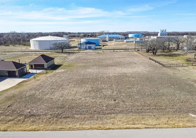 Photo 1 of Land for sale at 209 Maverick Ct, Granbury, TX 76049 | MLS# 21289878 | Listing updated on 2026-07-08