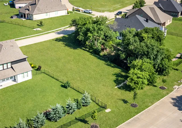 Photo 1 of Land for sale at 1408 Wolf Ridge Run, Gunter, TX 75058 | MLS# 21291603 | Listing updated on 2026-08-22