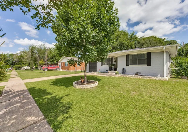 Photo 2 of Single family home for sale at 211 Brazos St, Garland, TX 75041 | MLS# 21291150 | Listing updated on 2026-08-22