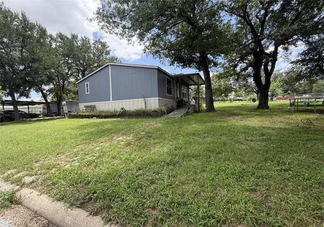 Photo 3 of Manufactured home for sale at 6112 Big Wood Ct, Fort Worth, TX 76135 | MLS# 21289455 | Listing updated on 2026-09-07