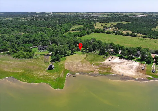 Photo 3 of Single family home for sale at 2435 E Lake Dr, Weatherford, TX 76087 | MLS# 21288342 | Listing updated on 2026-09-03