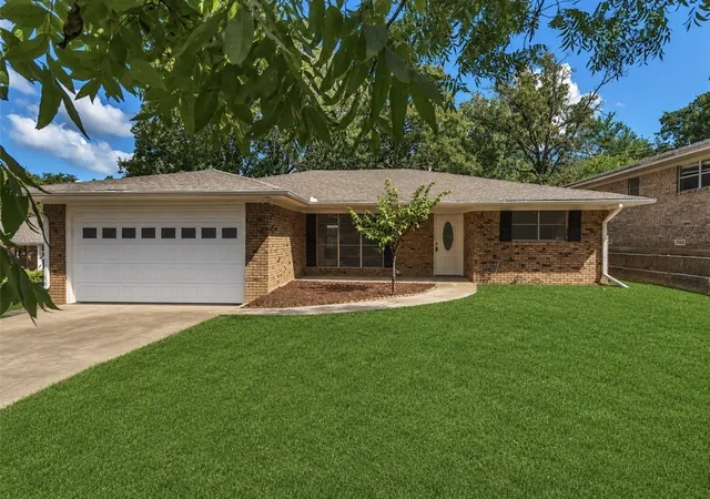 Photo 1 of Single family home for sale at 1335 Crestview Dr, Denison, TX 75020 | MLS# 21299386 | Listing updated on 2026-09-23