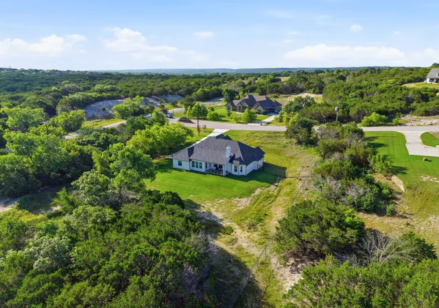 Photo 1 of Single family home for sale at 100 Cedar Mountain Dr, Weatherford, TX 76085 | MLS# 21293440 | Listing updated on 2026-09-30