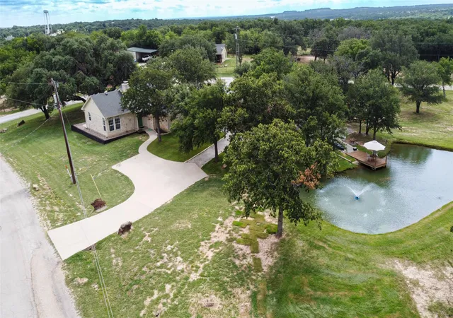 Photo 1 of Sale Pending at 365 Cimmarron Trl, Runaway Bay, TX 76426 | MLS# 21300448 | Listing updated on 2026-08-24