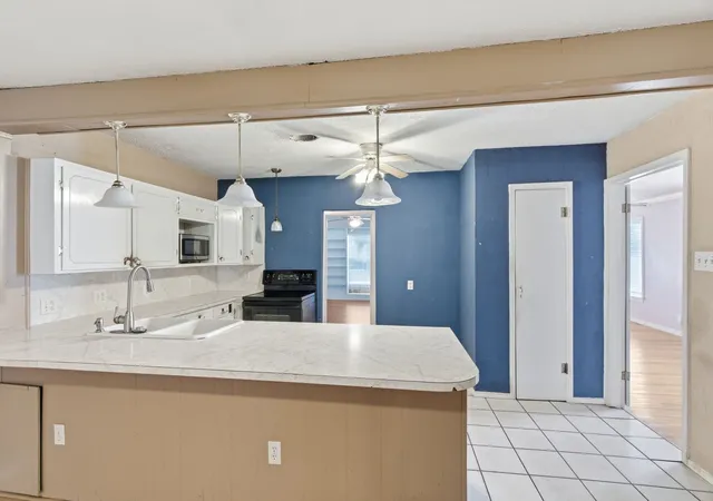 Photo 4 of Single family home for sale at 311 W 7Th St, Irving, TX 75060 | MLS# 21302586 | Listing updated on 2026-07-15