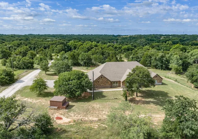 Photo 2 of Single family home for sale at 910 County Road 1111, Decatur, TX 76234 | MLS# 21303921 | Listing updated on 2026-08-22