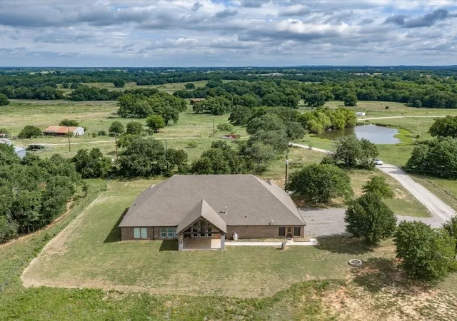 Photo 3 of Single family home for sale at 910 County Road 1111, Decatur, TX 76234 | MLS# 21303921 | Listing updated on 2026-08-22