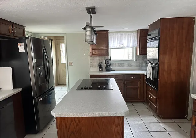 Photo 2 of Single family home for sale at 2312 Westbrook Dr, Carrollton, TX 75007 | MLS# 21269111 | Listing updated on 2026-07-16