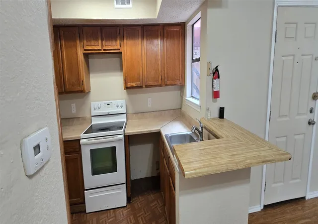 Photo 4 of Condo for sale at 9805 Walnut St #204, Dallas, TX 75243 | MLS# 21306177 | Listing updated on 2026-08-22
