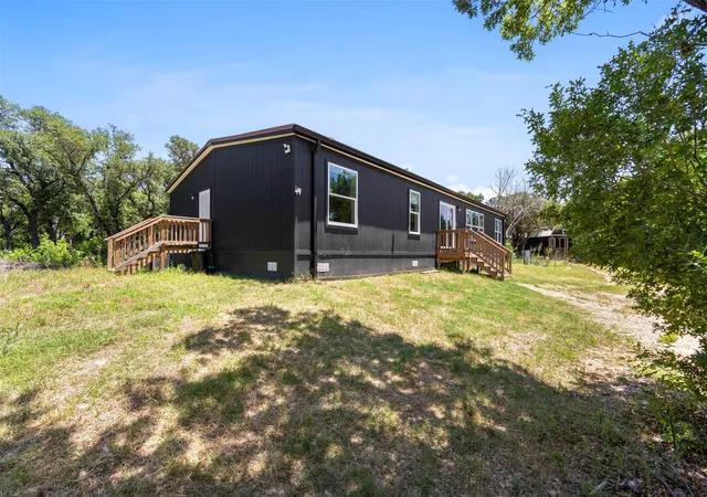 Photo 3 of Manufactured home for sale at 4674 Azle Hwy, Weatherford, TX 76085 | MLS# 21305728 | Listing updated on 2026-08-27